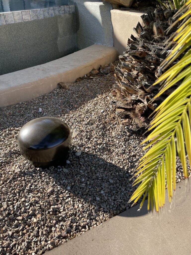 speaker outside by a pool