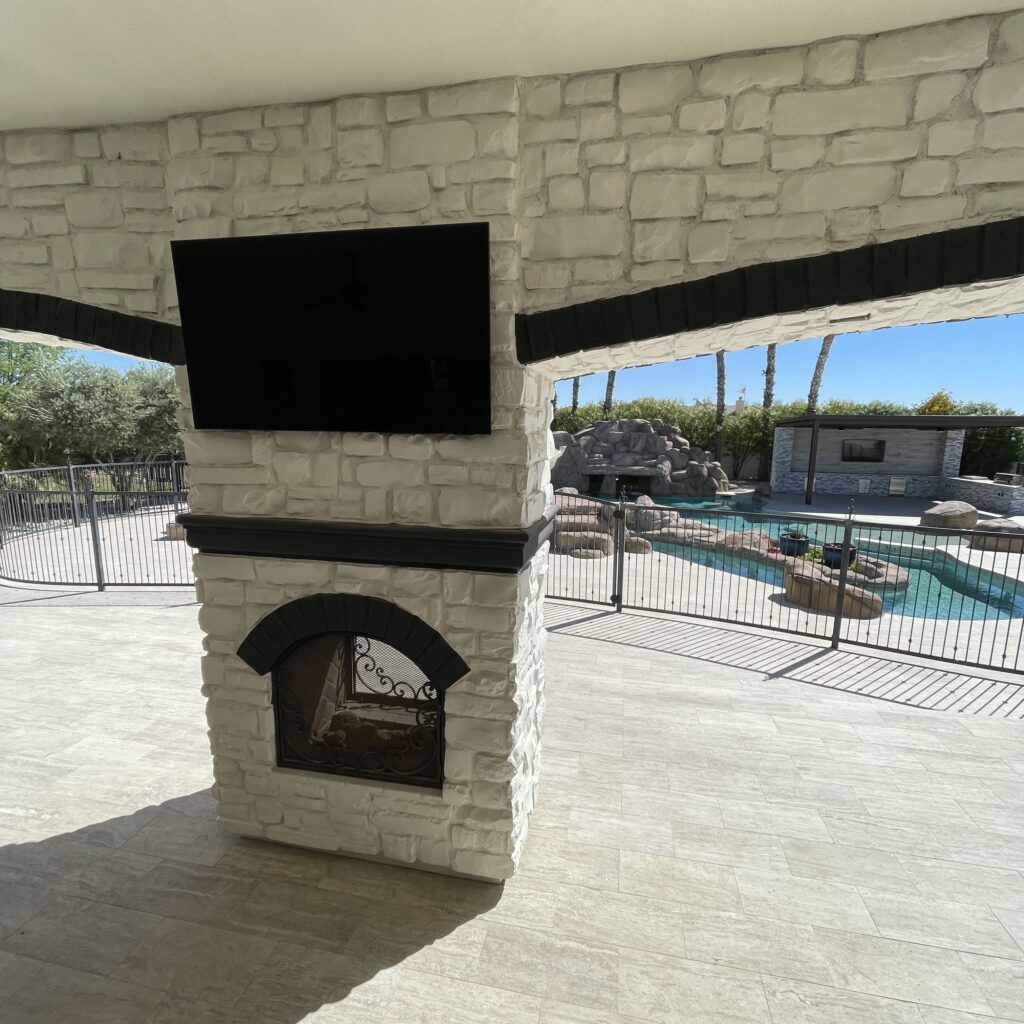 tv installation on brick outside